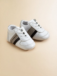 Cozy leather sneakers in a lace-up silhouette with bold stripes and logo detail.Lace-up97% lambskin/3% goatskin upperGoatskin liningLeather solePadded insoleImported Cozy leather sneakers in a lace-up silhouette with bold stripes and logo detail.Lace-up97% lambskin/3% goatskin upperGoatskin liningLeather solePadded insoleImported
