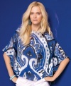Blue and bold, INC's fluid blouse channels the allure of this season's exotic print trend! (Clearance)