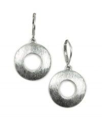 Make a stellar statement in lunar circles. Earrings by Jones New York feature chic, cut-out circles. Setting and leverback crafted in silver tone mixed metal. Approximate drop: 1-3/8 inches. Make a stellar statement in lunar circles. Earrings by Jones New York feature chic, cut-out circles. Setting and leverback crafted in silver tone mixed metal. Approximate drop: 1-3/8 inches.