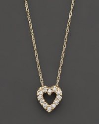 A beautiful diamond heart pendant in 14 Kt. yellow gold, with rope chain. A beautiful diamond heart pendant in 14 Kt. yellow gold, with rope chain.