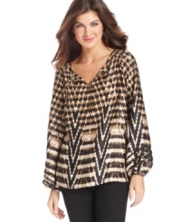 Jones New York Signature's graphic printed peasant top instantly enlivens casual days. Pair it with basic trousers for an on-point ensemble. Jones New York Signature's graphic printed peasant top instantly enlivens casual days. Pair it with basic trousers for an on-point ensemble.