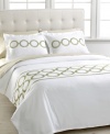 Come full circle. A touch of golden glimmer gives this Circles duvet cover set an enchanting allure, featuring a beautiful circular design on a pristine white ground all in pure cotton sateen for a soothing finish.