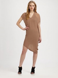 Airy chiffon, draped from shoulder to hem in a sleek asymmetrical shift.V necklineDropped shouldersShort asymmetrical sleevesPullover styleAsymmetrical hemAbout 26 from natural waistPolyesterDry cleanMade in USA of imported fabricModel shown is 5'9½ (176cm) wearing US size 4. Airy chiffon, draped from shoulder to hem in a sleek asymmetrical shift.V necklineDropped shouldersShort asymmetrical sleevesPullover styleAsymmetrical hemAbout 26 from natural waistPolyesterDry cleanMade in USA of imported fabricModel shown is 5'9½ (176cm) wearing US size 4.