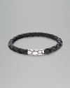 Black leather cord bracelet with signature kali clasp in sterling silver. 9 long Handmade in Indonesia