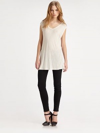 Lengthy, fluid v-neck with an effortless boxy fit and a dash of silk. Rounded v-neckCap sleevesLonger length hits below the hips67% rayon/33% silkHand washImportedModel shown is 5'10 (177cm) wearing US size Small. Lengthy, fluid v-neck with an effortless boxy fit and a dash of silk. Rounded v-neckCap sleevesLonger length hits below the hips67% rayon/33% silkHand washImportedModel shown is 5'10 (177cm) wearing US size Small.