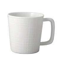 An ideal service for contemporary interiors, the simplicity of the finish resembles the weave of a natural fabric. The basis for Everyday Elegance, this versatile porcelain service offers the ability to go from day to evening with the substitution of a mug to tea cup/saucer and coupe soup to rim soup.