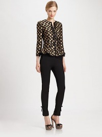 Featuring a peplum waist, one of the hottest trends of the season, this leopard-print jacquard jacket with metallic accents, is beyond eye-catching.Round collarLong sleevesSelf-tie detail at necklineFront zipperPrincess seamsPatch pocketsPeplum waistAbout 21 from shoulder to hem56% polyester/30% acetate/11% wool/3% polyamideDry cleanMade in Italy of imported fabric Featuring a peplum waist, one of the hottest trends of the season, this leopard-print jacquard jacket with metallic accents, is beyond eye-catching.Round collarLong sleevesSelf-tie detail at necklineFront zipperPrincess seamsPatch pocketsPeplum waistAbout 21 from shoulder to hem56% polyester/30% acetate/11% wool/3% polyamideDry cleanMade in Italy of imported fabric