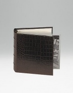 Crafted of crocodile-embossed Italian calfskin, this handsome design is the perfect way to store and display treasured photos. 18 clear pocket leaves hold 36, 4 X 6 photos 5½ X 6¾ Made in USA