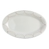 This elegant assortment of weighty ceramic serveware features Juliska's signature thread-and-berry detailing. Finished in a rich, warm white hue, each piece showcases a slightly distressed, timeworn appearance.