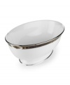 For nearly 150 years, Lenox has been renowned throughout the world as a premier designer and manufacturer of fine china. The Vintage Jewel pattern from Lenox's dinnerware and dishes collection evokes a more gracious era, combining pure white bone china with a dark, richly patterned band of muted gold, taupe, charcoal, and black, and accented with subtle touches of cobalt blue.