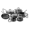 Formed of hard anodized aluminum for lasting strength and durability, each piece in this modern cookware assortment features a nonstick interior that ensures easy release and cleanup, plus stay-cool handles for comfortable transport.