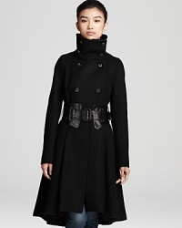 Bring high style to your winter wardrobe with this chic funnel-collared coat boasting a bold, waist-cinching belt from Mackage. Bring high style to your winter wardrobe with this chic funnel-collared coat boasting a bold, waist-cinching belt from Mackage.