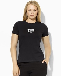 An iconic tee in soft cotton jersey is embellished with a beaded logo for a chic, heritage look. An iconic tee in soft cotton jersey is embellished with a beaded logo for a chic, heritage look.