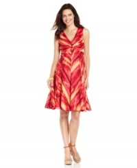 Brighten up any day with a burst of color from Jones New York Signature. This pretty dress features a feminine silhouette and an abstract brushstroke print for summery appeal. Brighten up any day with a burst of color from Jones New York Signature. This pretty dress features a feminine silhouette and an abstract brushstroke print for summery appeal.
