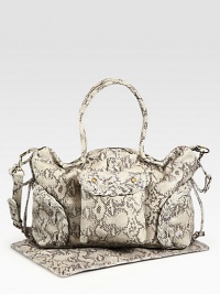 Hard to think of this fabulous, ultra roomy bag of rich, snake-embossed leather as just for diapers and bottles since its stunning style will last long after your baby's outgrown it.Double top handles, 8¾ dropRemovable, adjustable shoulder strap, 15-24 dropTop zip closeAntiqued brass hardwareProtective metal feetSix outside pockets Hard to think of this fabulous, ultra roomy bag of rich, snake-embossed leather as just for diapers and bottles since its stunning style will last long after your baby's outgrown it.Double top handles, 8¾ dropRemovable, adjustable shoulder strap, 15-24 dropTop zip closeAntiqued brass hardwareProtective metal feetSix outside pockets