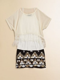 Light-as-air chiffon is layered and adorned with flirty fringe for a flapper-inspired ensemble.ScoopneckShort sleevesPullover stylingFringe hemPolyesterHand wash coldImported Light-as-air chiffon is layered and adorned with flirty fringe for a flapper-inspired ensemble.ScoopneckShort sleevesPullover stylingFringe hemPolyesterHand wash coldImported