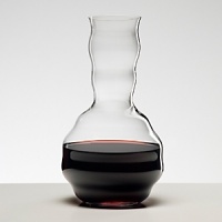 Machine-blown in Germany by Riedel, the world's most-renowned wineglass maker, this decanter fuses form and function, featuring a classic rounded base and sensual lines that graduate up the neck. The pour spout is designed for a drip-free flow, and the beautiful shape also serves to expose wine to more oxygen for a more developed bouquet and fuller flavors. Machine-blown in Germany by Riedel, the world's most-renowned wineglass maker, this decanter fuses form and function, featuring a classic rounded base and sensual lines that graduate up the neck. The pour spout is designed for a drip-free flow, and the beautiful shape also serves to expose wine to more oxygen for a more developed bouquet and fuller flavors.
