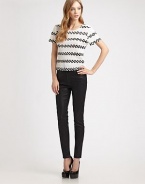 Coated cotton twill in a high-rise silhouette with skinny-leg construction. THE FITHigh-rise Skinny leg Rise, about 10 Inseam, about 28THE DETAILSZip fly Button closure Five-pocket style 92% cotton/7% polyester/1% spandex Dry clean Made in USA