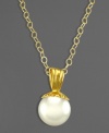 Like a luminous full moon, this pendant is sure to make your precious one shine. Setting and chain crafted in 14k gold with a cultured freshwater pearl pendant (5 mm). Approximate length: 15 inches.