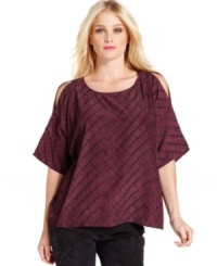 Show a little shoulder in this Calvin Klein Jeans top, complete with a knit-inspired print and cut-outs at the shoulders. Show a little shoulder in this Calvin Klein Jeans top, complete with a knit-inspired print and cut-outs at the shoulders.