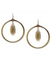 Topaz takes center stage on these hoop earrings from Jessica Simpson. The hoops are crafted from gold tone mixed metal. Approximate drop: 3 inches.