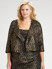 When the occasion calls for a little dazzle, here's an elegant option in a modern brocade, with a cropped length and an easy boxy shape.Round necklineWide lapelsOpen frontThree-quarter sleevesCropped lengthAbout 20 from shoulder to hemViscose/spandexDry cleanMade in USA