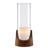 Bring an ambient glow to gatherings indoor or out with this distinctively modern hurricane from Dansk. In an elegant pairing of raw materials and minimalist design, a richly grained wood base supports a slim cylinder formed of sparkling clear glass.
