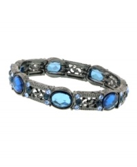 Sparkle and shine in art deco style by 2028. Etched floral filigree bracelet features faceted Austrian crystals in sapphire and Montana blue hues. Crafted in hematite-plated mixed metal. Stretches to fit wrist. Approximate diameter: 2-1/2 inches. Sparkle and shine in art deco style by 2028. Etched floral filigree bracelet features faceted Austrian crystals in sapphire and Montana blue hues. Crafted in hematite-plated mixed metal. Stretches to fit wrist. Approximate diameter: 2-1/2 inches.