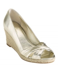 Get whisked away with resort-inspired style. The Air Camila wedges by Cole Haan feature a tropical jute wedge and criss-crossing straps at a cute peep toe. Get whisked away with resort-inspired style. The Air Camila wedges by Cole Haan feature a tropical jute wedge and criss-crossing straps at a cute peep toe.