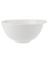 Reshape modern tables with the Flow vegetable bowl from Villeroy & Boch. A fluid, asymmetrical design in white fine china offers unconventional elegance for every meal and occasion. Perfect for a mound of buttery mashed potatoes, green beans or stew.