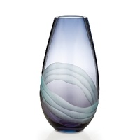 Featuring striking designs, dynamic shapes and dramatic color combinations – mouth blown and hand finished in the studios of Europe's foremost glass artisans – each Evolution piece is a one-of-a-kind example of high artistic vision, fashioned with expert technical dexterity and careful attention to detail from a vibrant palette of refined colors. Blending turquoise and purple to create a blissful shade of indigo, the Oasis collection is sure to infuse the home with a sense of calm, depth, and tranquility. Featuring striking designs, dynamic shapes and dramatic color combinations – mouth blown and hand finished in the studios of Europe's foremost glass artisans – each Evolution piece is a one-of-a-kind example of high artistic vision, fashioned with expert technical dexterity and careful attention to detail from a vibrant palette of refined colors. Blending turquoise and purple to create a blissful shade of indigo, the Oasis collection is sure to infuse the home with a sense of calm, depth, and tranquility.