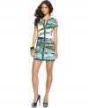 Contrasting bold prints make a bright splash on this BCBGMAXAZRIA sheath dress -- perfect for hot summer style!