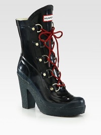 Vibrant laces top this durable rubber boot with a towering heel and platform. Rubber heel, 4½ (115mm)Rubber platform, 1 (25mm)Compares to a 3½ heel (90mm)Shaft, 6½Leg circumference, 12Rubber upperNylon liningRubber trek solePadded insoleImported