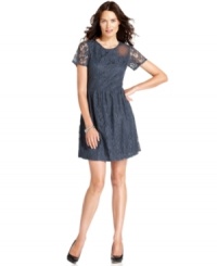NY Collection's lace dress features sheer sleeves and a sweet silhouette. NY Collection's lace dress features sheer sleeves and a sweet silhouette.