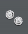 Style fit for a star. Wear this sparkling pair for any occasion, but be prepared to turn heads. Round-cut diamonds (1 ct. t.w.) shine amongst a halo of diamond accents. Crafted in 14k white gold. Approximate diameter: 7-1/2 mm.