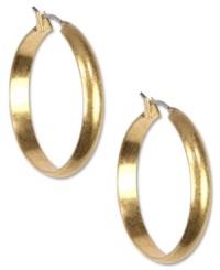 Amp up your jewelry box with these hoops from Jones New York. Finished with a wide design and a click top. Crafted from worn gold tone mixed metal. Approximate drop: 1-1/4 inches.