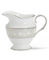 Get set for coffee and dessert. This elegant bone china creamer completes your course with a delicate floral design with textured white beads and elegant platinum trim. From Lenox's dinnerware and dishes collection.