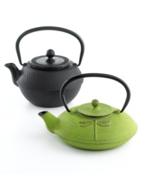 Revive the tradition of relaxing tea time with a cast iron tea pot in a whimsical dragonfly design. Stocked with a stainless steel loose tea infuser, this pot brews a blend like none you've ever tasted, enhancing the flavor and distributing heat more evenly through its cast iron core. Revive the tradition of relaxing tea time with a cast iron tea pot in a whimsical dragonfly design. Stocked with a stainless steel loose tea infuser, this pot brews a blend like none you've ever tasted, enhancing the flavor and distributing heat more evenly through its cast iron core.