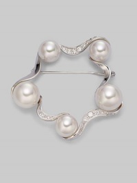 White round pearls, cradled within gorgeous curves of rhinestone-encrusted sterling silver, add instant elegance on your blazer lapel or scarf.10mm and 12mm round white pearls Cubic zirconia Sterling silver Width, about 2 Pin backing Made in Spain 