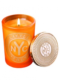 From a uniquely New York collection of scents, this unisex scented candle celebrates the lively charm of Little Italy.  · Blend of mandarin, sweet tangerine, Clementine and musk  · Made of the finest wax and wicks  · In sturdy, tinted glass container  · Gilt metal cap keeps scent from fading 