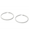 Go full-blitz with these glitzy hoop earrings from Fossil. The classic design is amped up with clear pave crystal accents. Crafted in polished stainless steel. Approximate diameter: 2 inches.