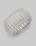 EXCLUSIVELY AT SAKS. From the Eden II Collection. Sparkling crystal pavé in a striped pattern for the ultimate eye-catching piece.Crystal Rhodium plated Diameter, about 2½ Width, about 1½ Hinged opening Push lock clasp Imported 