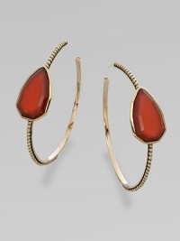 From the Trujillo Collection. A slender beaded hoop has a striking centerpiece of a faceted teardrop of rich red agate.Red agateBronzeDiameter, about 2Post backMade in USA From the Trujillo Collection. A slender beaded hoop has a striking centerpiece of a faceted teardrop of rich red agate.Red agateBronzeDiameter, about 2Post backMade in USA