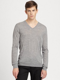 A simple v-neck sweater goes a long way in achieving great style and sophistication and this neatly-shaped rendition is no exception. Knitted from fine merino wool, this pullover is soft and lightweight, making it an ideal choice for seasonal layering.V necklineBanded cuffs and hemMerino woolDry cleanImported A simple v-neck sweater goes a long way in achieving great style and sophistication and this neatly-shaped rendition is no exception. Knitted from fine merino wool, this pullover is soft and lightweight, making it an ideal choice for seasonal layering.V necklineBanded cuffs and hemMerino woolDry cleanImported
