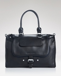 A stylishly smart Longchamp travel bag goes the distance, styled in rich leather and complemented by rolled top handles. Its top zip closure opens to a lined interior with 3 pockets. A stylishly smart Longchamp travel bag goes the distance, styled in rich leather and complemented by rolled top handles. Its top zip closure opens to a lined interior with 3 pockets.