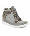Casual chic with bite: The Les 200 wedge sneakers by Nine West Original are a brilliant high-top with snake-embossed detail for one-of-a-kind style.