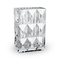 Inspired by a celebrated design of George Chevalier in the 1930s, Thomas Bastide's diamond-cut vase featuring grand pyramids is a striking way to showcase your favorite blooms. Inspired by a celebrated design of George Chevalier in the 1930s, Thomas Bastide's diamond-cut vase featuring grand pyramids is a striking way to showcase your favorite blooms.