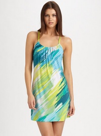 Asymmetrical brushstrokes in oceanic tones cover this lightweight design, with an unexpected front keyhole. Gathered scoopneckAdjustable spaghetti strapsFront shirringRacerbackAbout 32 from shoulder to hem92% polyester/8% spandexMachine washImported Asymmetrical brushstrokes in oceanic tones cover this lightweight design, with an unexpected front keyhole. Gathered scoopneckAdjustable spaghetti strapsFront shirringRacerbackAbout 32 from shoulder to hem92% polyester/8% spandexMachine washImported