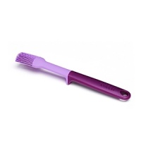 With durable silicone bristles, this elevated Joseph Joseph basting brush works harder than standard basting and pastry brushes to glaze, baste, brush and grease. The built-in tool rest keeps your work surface neat and hygienic. With durable silicone bristles, this elevated Joseph Joseph basting brush works harder than standard basting and pastry brushes to glaze, baste, brush and grease. The built-in tool rest keeps your work surface neat and hygienic.