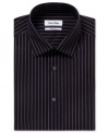 Attractive stripes on this Calvin Klein dress shirt upgrade your daytime desk look.